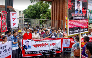 ব্যবসায়ী হাসান হত্যাকারীদের বিচারের দাবিতে অবস্থান কর্মসূচী 