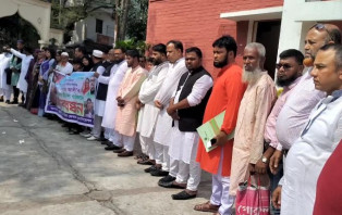 জেলা পরিষদ সদস্যের উপর হামলার প্রতিবাদে ফরিদপুরে মানববন্ধন