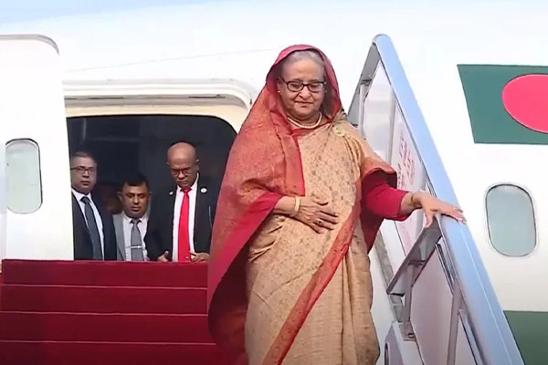 চীন সফর শেষে দেশে ফিরেছেন প্রধানমন্ত্রী