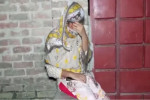 বিষের বোতল নিয়ে প্রবাসীর বাড়িতে তরুণীর অনশন